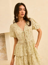 Yarı Şeffaf Çiçek Desenli Peplum Önden Bağlamalı Bluz